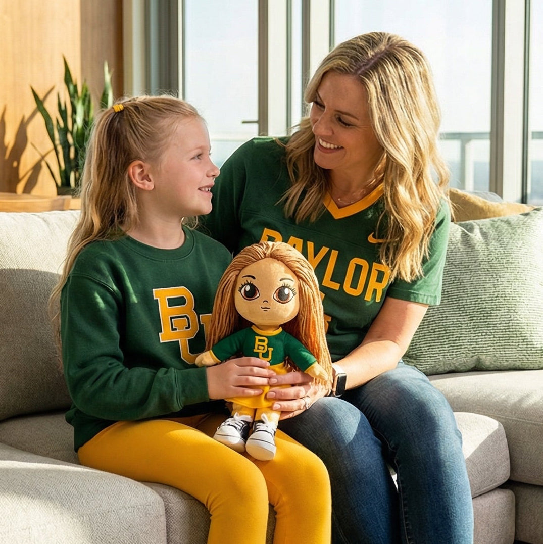 Woman and child sitting on a couch holding a toy, with a cityscape view through large windows.