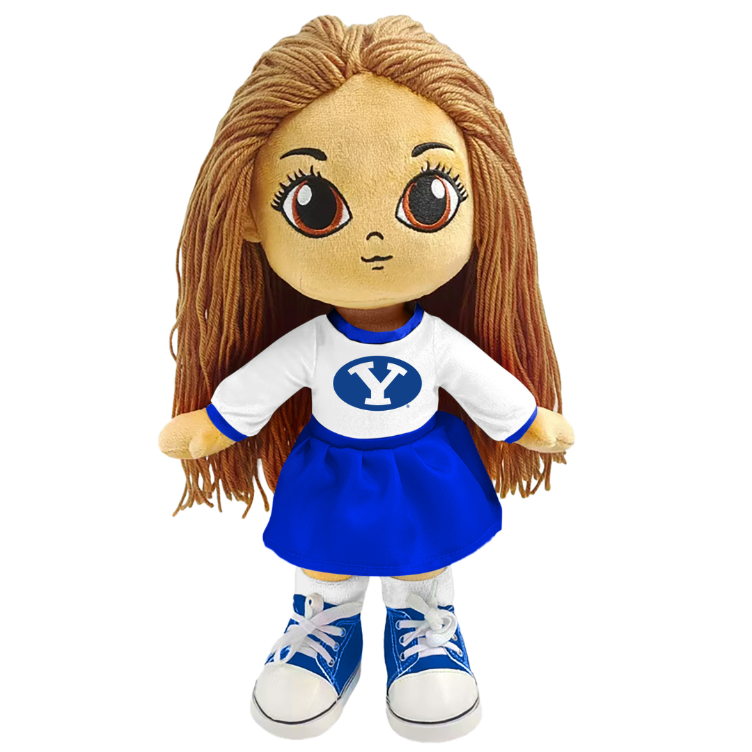 Plush doll with brown hair, white shirt with blue 'Y', blue skirt, and blue shoes on a white background
