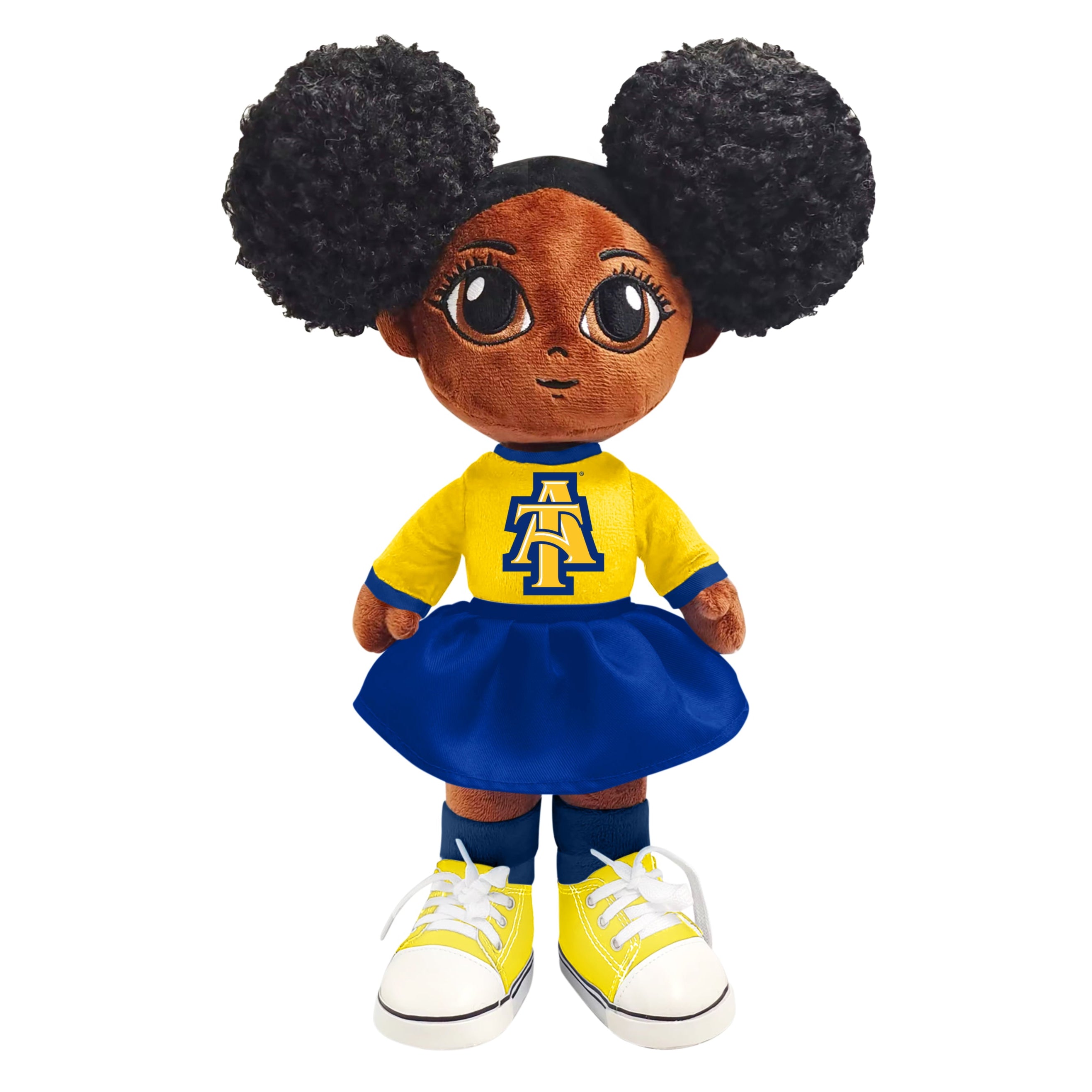 Plush doll with yellow shirt, blue skirt, and black hair buns on a white background